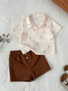SHEIN Baby/Baby Boy Casual Cute Palm Tree Print Vacation Style Polo Collar Short Sleeve Shirt And Shorts Set, Spring/Summer Baby Boy Vacation Style Skirt Set Baby/Baby Boy Outfit Sets Hawaii Style Skirt Baby Boy Summer Polo Baby Summer Outfit Boy Baby Boy Polo Shirt Baby Boy Summer Outfit Polo Shirt For Baby Boy - Khaki - View 4