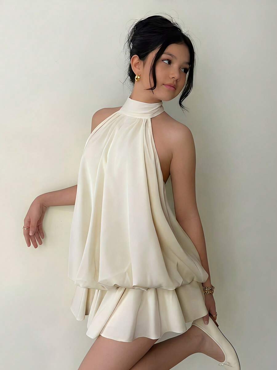 SHEIN 1pc Girls' Adjustable Halter Solid Color Dress, Backside Hollow Design, Suitable For Summer Travel, Vacation, Beach Wear - Apricot - View 1