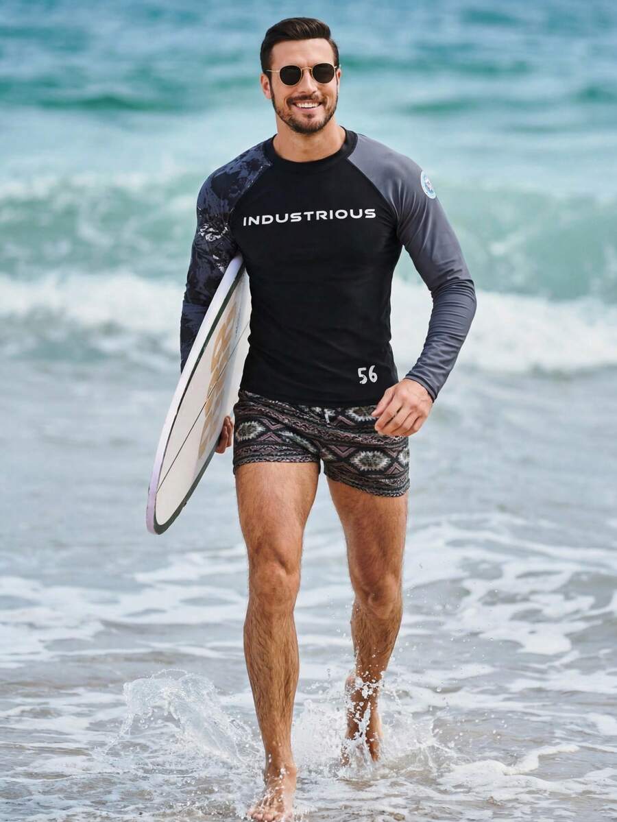 DAZY Camiseta de protección solar con estampado de letras y mangas empalmadas para hombre, traje de baño de ajuste ceñido para el verano - Negro - Ver 1