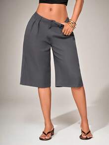 Radiana Quần short Bermuda nữ kiểu dáng tối giản, cạp thấp, cực kỳ thời trang, ống rộng, dài đến đầu gối, quần short đi làm, quần màu xám, quần short Bermuda cạp thấp, quần tây màu xám, quần tây cạp thấp, trang phục công sở thường ngày, trang phục văn phòng, quần áo phong cách cổ điển. - Màu xám đen - Xem 5