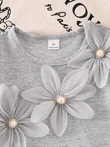 SHEIN Elladie kids Bộ 2 món cho bé gái, áo thun ngắn tay màu xám họa tiết hoa cài ngọc trai và quần ống loe màu xám, trang phục mùa hè dễ thương. - Xám - Xem 8