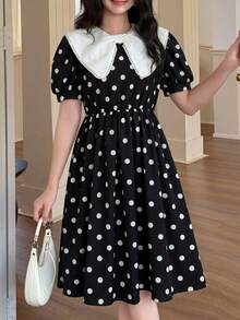 SHEIN 少女优雅返校季蝴蝶印花黑白撞色A字公主裙，适合春季假期、度假、派对、返校季、假日家庭户外春季野餐、日常穿着。 - 黑與白 - 查看 5