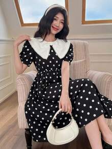 SHEIN 少女优雅返校季蝴蝶印花黑白撞色A字公主裙，适合春季假期、度假、派对、返校季、假日家庭户外春季野餐、日常穿着。 - 黑與白 - 查看 6