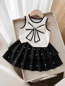 Genkimix Kids Bộ đồ bé gái (size nhỏ) gồm áo không tay đính nơ 3D màu mơ, chân váy xòe đính hạt đen và họa tiết ngôi sao, mềm mại và thoải mái, ngọt ngào và dễ thương, trang phục mùa hè thời trang cho bé gái, thích hợp cho kỳ nghỉ, du lịch và nghỉ mát. - Màu be - Xem 3