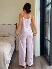 SHEIN Bộ đồ ngủ 2 mảnh dành cho nữ, gồm áo hai dây và quần dài kẻ sọc có nơ. - Hồng - Xem 2