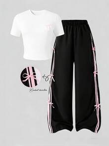 SHEIN 两件套少女白色短袖上衣和黑色长裤套装，蝴蝶结装饰，适合春夏季节、运动、通勤等场合，百搭休闲装。 - 黑與白 - 查看 7