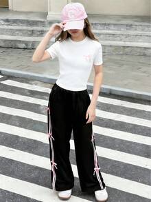 SHEIN 两件套少女白色短袖上衣和黑色长裤套装，蝴蝶结装饰，适合春夏季节、运动、通勤等场合，百搭休闲装。 - 黑與白 - 查看 3