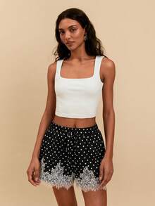 Travachic Quần short nữ màu đen chấm bi phối ren phong cách casual thanh lịch đa năng mặc hàng ngày hẹn hò du lịch Tulum, mẫu mới 2026, quần short ren nữ, quần short mùa hè, quần short đi lễ hội, họa tiết thời trang - màu đen - Xem 6