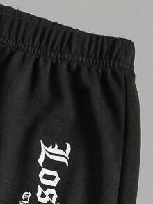 Bộ đồ thường ngày cho bé gái tuổi teen: Áo thun trắng in chữ xanh và quần legging xanh. - Đen và trắng - Xem 4