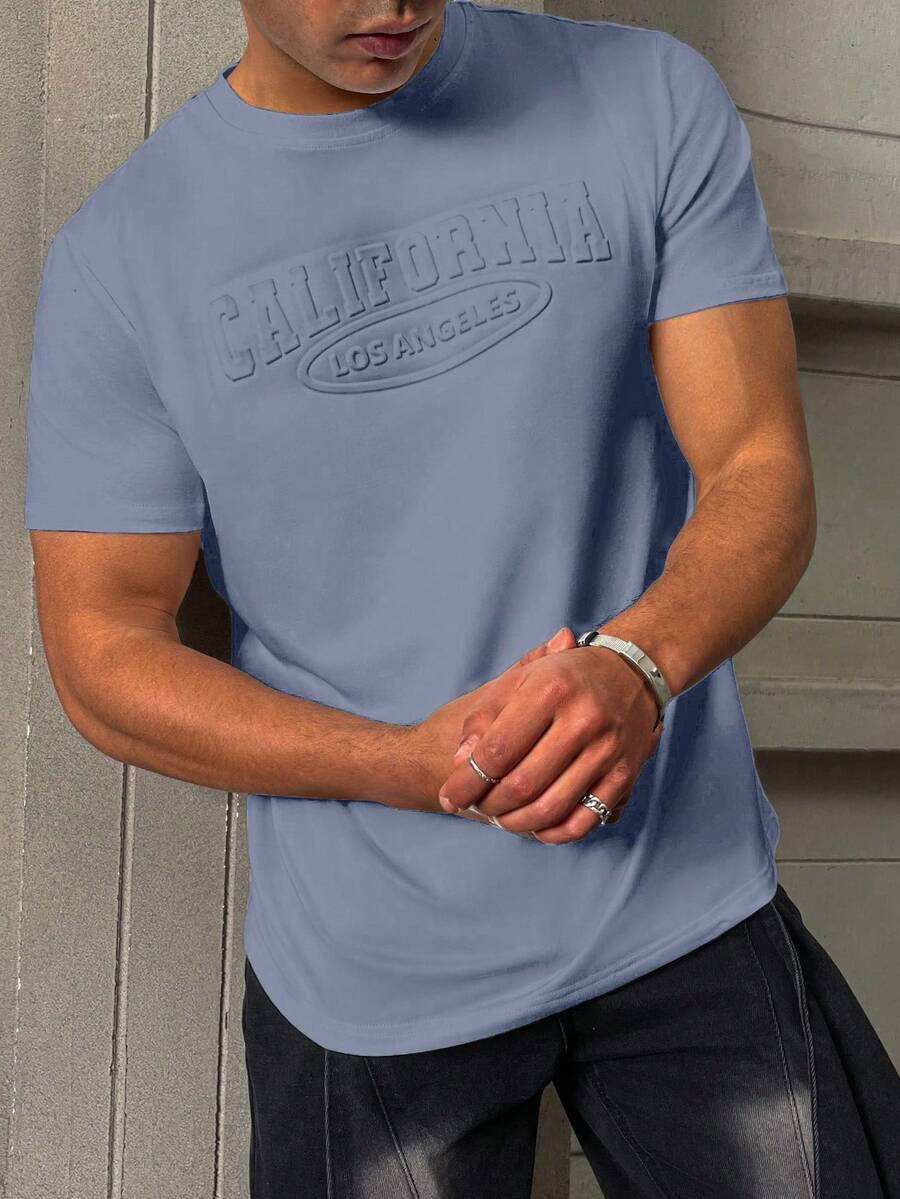 Manfinity Homme Camiseta de manga corta de cuello redondo casual con estampado de letras para hombre, verano - Neblina azul - Ver 1