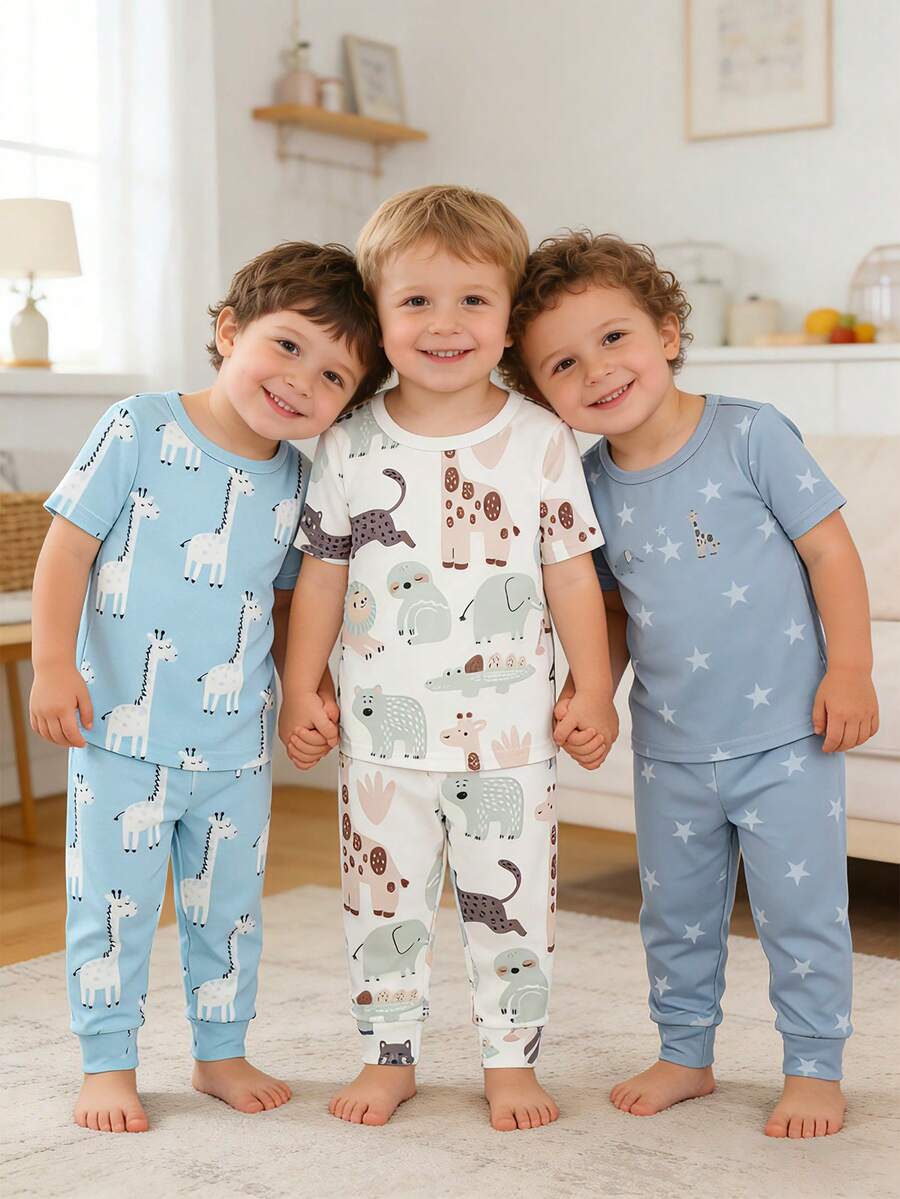 Bộ đồ ngủ 6 món cho bé trai gồm áo cổ tròn tay ngắn và quần dài mềm mại cùng màu. Bộ sưu tập mùa hè này có họa tiết khủng long và ngôi sao hoạt hình nhiều màu sắc xanh nhạt và xanh lam đậm, thích hợp cho các bé năng động. Chất vải mềm mại mang lại sự thoải mái cho bé khi mặc ở nhà hoặc ngủ. - Nhiều màu - Xem 1