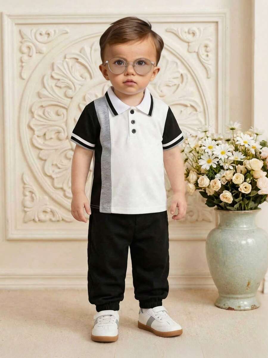 Souflis Souflis Polo de punto para bebé niño. Es adecuado para usar cuando se sale, asiste a la escuela o en fiestas. Parte superior unisex de verano - Blanco y Negro - Ver 1