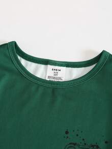 2 pièces Ensemble de pyjama ajusté pour garçons, tenue de détente d'été avec Top à col rond et manches courtes et short assorti, vert foncé avec imprimé graphique de console de jeu vidéo numérique noir sur un tissu en maille stretch doux - Vert - Voir 4