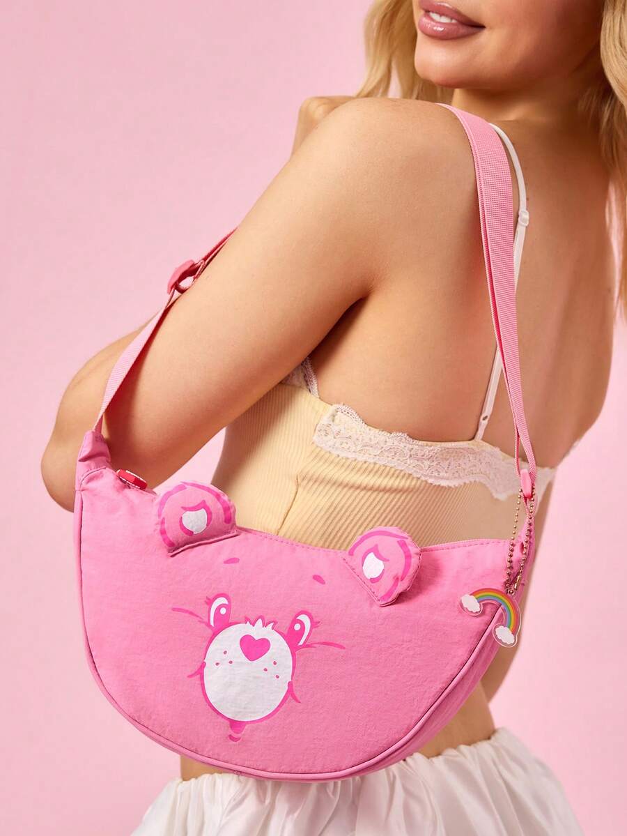SHEIN X Care Bears 1 件装卡通图案印花装饰斜挎包,斜挎包,小包,适合旅行、通勤、外出等,适合学生、男女,图案为欢呼熊、分享熊 - 粉色 - View 1