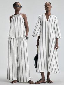 Ontre Đầm dài nữ mới 2026SS, vải dệt kẻ sọc, đầm maxi xẻ tà, phong cách nghỉ mát, trang phục đi nghỉ lễ, đầm nữ đen trắng cổ chữ V tay lỡ, trang phục thanh lịch tối giản thành thị, trang phục đi làm cho giáo viên, trang phục mùa hè, đầm thường ngày, trang phục đi biển, đầm dự đám cưới, đầm dự tiệc, đầm hẹn hò lãng mạn, thiết kế dáng chữ A rộng rãi, chất liệu thoải mái, đầm dài nữ bán chạy nhất thời trang. - Đen và trắng - Xem 6