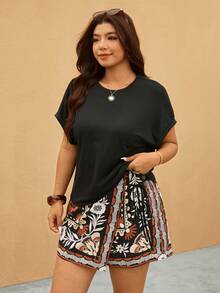 Elaquor Áo thun ngắn tay phong cách Bohemian tối giản dành cho nữ cỡ lớn phối cùng chân váy/quần short in họa tiết hoa và cây nhiệt đới. Bộ quần short cỡ lớn dành cho nữ. Trang phục mùa hè cỡ lớn dành cho nữ. Váy Zanzea dành cho nữ cỡ lớn. Váy cỡ lớn phối với quần short. Trang phục công sở thường ngày dành cho nữ. Trang phục đi nghỉ mát thường ngày cỡ lớn. Váy hoa phong cách Boho. - màu đen - Xem 3