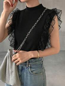 FRIFUL Camiseta sin mangas de mujer con cuello alto acanalado, con volantes de malla y diseño de capa - Negro - Ver 3