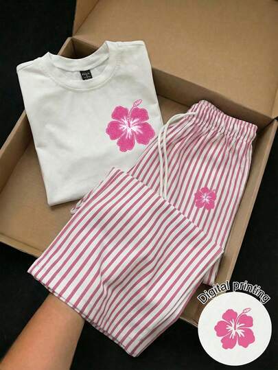 SHEIN EZwear مجموعة ملابس علوية كم قصير مطرز بطباعة زهور وخطوط، وبنطلون مخطط، ملابس كاجوال مناسبة للتنقل اليومي، المواعدة، الحفلات، الخريف/الشتاء/الصيف، عيد الميلاد، رأس السنة، ، الحفلات، الزفاف، الشاطئ، التخرج، الموضة، أنيقة، كاجوال، الخروج، المواعدة، الحجز، التنقل، لامع، عيد الحب، أنيقة، العطلة، كاجوال، Y2K، الخروج، التخرج وغيرها من المناسبات.