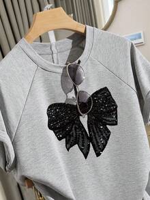 少女休闲经典碎花灰色落肩宽松短袖T恤套装，带口袋，亮片蝴蝶结，百搭，适合夏季，个性化T恤短裤套装，春日气息，夏日氛围，春夏穿搭，轻松舒适，时尚少女套装，休闲装，儿童碎花图案服装，春夏套装，新款，清凉舒适，春日氛围，轻松夏日假期 - 淺灰色 - 查看 3