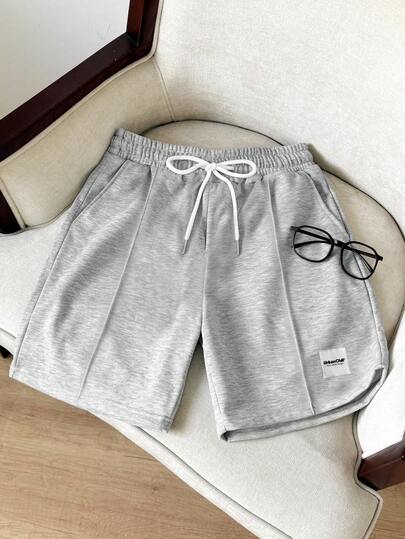 Manfinity Unisex Pantaloncini casual larghi da uomo, taglia standard, grigio tinta unita