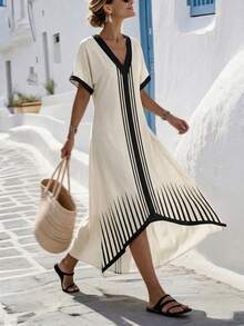 SHEIN Holidaya Đầm nữ mùa xuân/hè tối giản cổ chữ V kẻ sọc, thiết kế cổ chữ V + tay áo cánh dơi, kẻ sọc dọc đen trắng phía trước + họa tiết hình học tỏa tròn ở gấu đầm, gấu đầm đuôi cá bất đối xứng, chất liệu mềm mại, phù hợp cho công sở và các dịp thường ngày. Đặc điểm sản phẩm: Áo choàng in họa tiết hình học nữ, đầm cổ chữ V tay áo cánh dơi, đầm dáng suông bất đối xứng, đầm dài tối giản tương phản đen trắng, áo choàng công sở. - Màu be - Xem 4