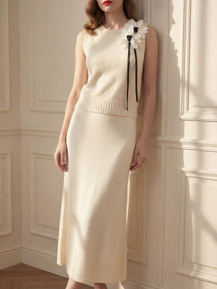 Suri Mira Nuevo conjunto de 2 piezas para otoño/invierno con chaleco de punto sin mangas de cuello redondo con flores 3D suelto y versátil, combinado con falda midi de línea A de punto para mujer - Beis - Ver 1