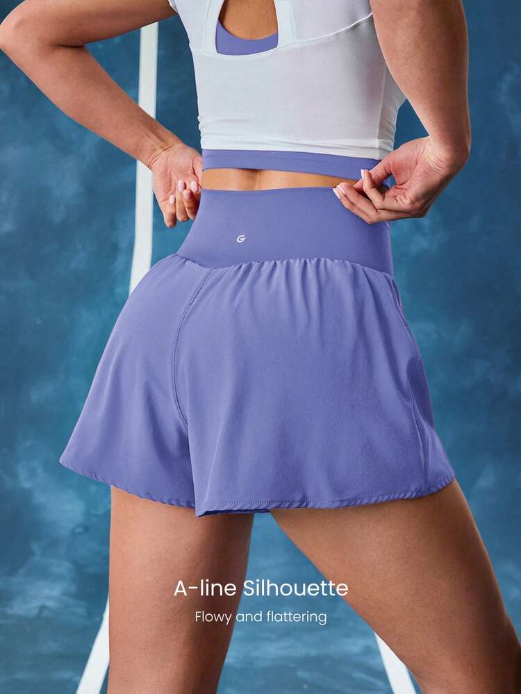 OptiDry Fierce Flow Soft Compressive Quick-Dry Side Pockets Non-Slip Grips Stretchy High Waist Flowy Crossover Eyelet Shorts Medium Impact Training Running Cycling Workout Gym Daily Active Wear