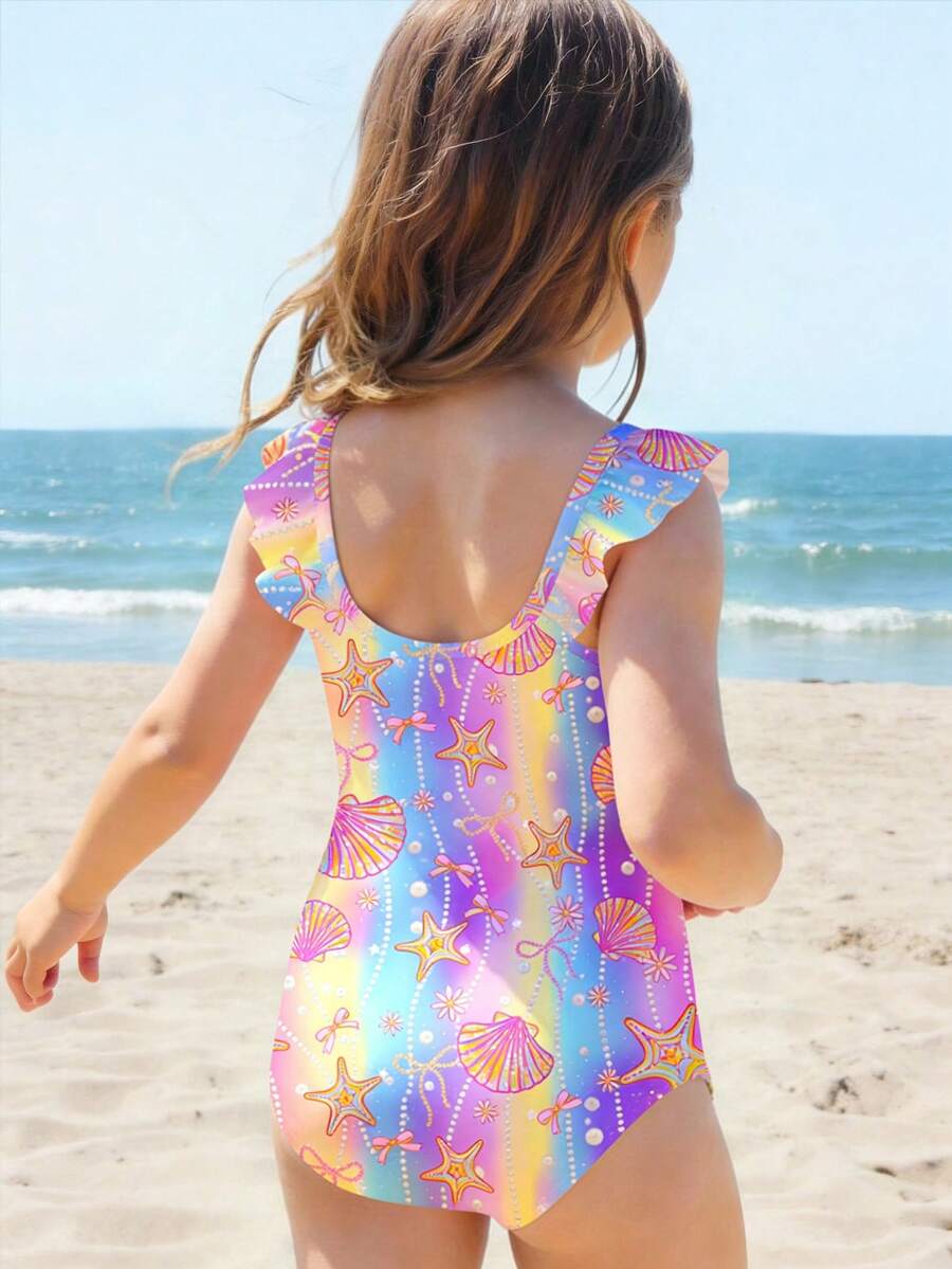 SHEIN Traje de baño de una pieza con mangas cortas para niña, con estampado de elementos marinos, estrellas de mar, conchas y perlas, ideal para vacaciones y playa - Multicolor - Ver 1