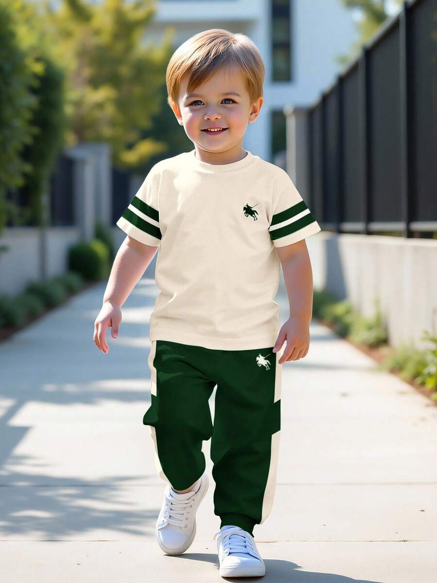 SHEIN Bộ đồ thể thao dáng rộng thoải mái, cổ tròn, tay ngắn và quần dài cho bé trai, kiểu dáng thể thao, thu đông mới. - Nhiều màu - Xem 1
