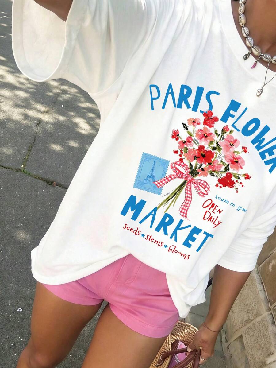 EMERY ROSE Camiseta gráfica del Mercado de Flores de París, Talla grande para mujer, Camiseta blanca con estampado de ramo de flores y Torre Eiffel, Parte superior casual de verano para uso diario y atuendos de vacaciones - Blanco - Ver 1