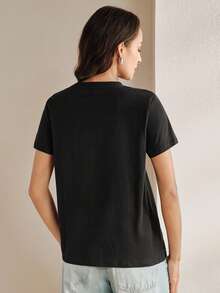 Anewsta Camiseta negra de cuello redondo con decoración de flores, cuentas y cristales - Negro - Ver 2
