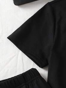 SHEIN Vacaura Jungen Frühling/Sommer Neuer Lächelndes Gesicht Muster Rundhals Kurzarm Blau Set, Lässig & Vielseitig für den Alltag - Schwarz - Übersicht 7