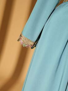 Rometta Elegantes Pendlerkleid in Große Größen für Damen mit gehäkelter Stickerei und Spitzeneinsatz, weiten Ärmeln und Bindegürtel, geeignet für Frühling/Sommer, Schule, Urlaub, Abschluss, Feiertage, Valentinstag, Weihnachten, Musikfestivals, Muttertag, Halloween, Erntedankfest, Ostern, Nationalfeiertag, Bälle, Geburtstage, Dates, Partys, Hochzeiten, Ausflüge - Fresh Green - Übersicht 9