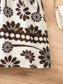 Sparklyn Đầm slip dáng suông in hoa cho bé gái, với họa tiết hoa màu nâu cacao trên nền trắng ngà tươi tắn, thiết kế dây mảnh và thắt eo tạo vẻ ngoài tinh nghịch, nữ tính, chân váy xòe bồng bềnh mang đến cảm giác mát mẻ, dễ chịu cho mùa hè, thích hợp cho những chuyến đi chơi và họp mặt gia đình, một item bắt mắt cho những chuyến du lịch của bạn. - màu nâu - Xem 3