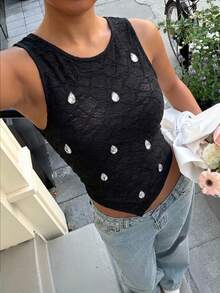 Muchica Áo tank top ôm sát người màu đen dệt kim bất đối xứng dành cho nữ - màu đen - Xem 1