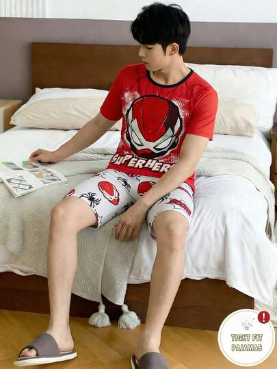 Bộ đồ ngủ 2 mảnh màu đen tối giản in hình đồ họa trò chơi điện tử dành cho bé trai tuổi teen, gồm áo tay ngắn và quần short.