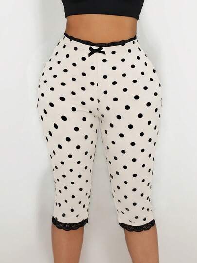 Sirith Quần legging nữ chấm bi đen trắng, viền ren và nơ trang trí.