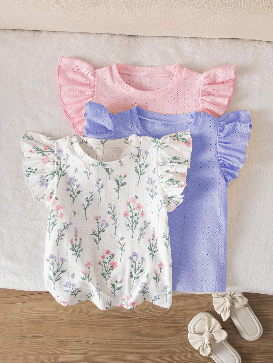 Sparklyn Áo thun trẻ em được làm từ chất liệu vải mềm mại cao cấp. Thiết kế cổ tròn tay loe cổ điển, tôn dáng vai và tạo sự thoải mái khi vận động. Màu hồng và tím tươi tắn, tự nhiên, làm nổi bật kết cấu vải đục lỗ. Phiên bản màu trắng in họa tiết bó hoa tươi mát. Thích hợp cho mặc hàng ngày, đi chơi công viên hoặc các chuyến đi chơi gia đình. - Màu tím - Xem 1