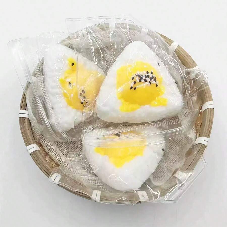 POKOJA LAND Niannile最畅销的饭团、蛋糕和面包食物玩具，是逼真且具有减压功能的高端玩具。 - 彩色 - 查看 1