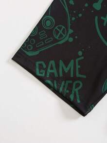 2 pièces Ensemble de pyjama ajusté pour garçons, tenue de détente d'été avec Top à col rond et manches courtes et short assorti, vert foncé avec imprimé graphique de console de jeu vidéo numérique noir sur un tissu en maille stretch doux - Vert - Voir 6