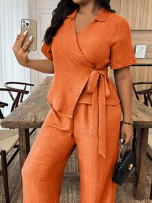 Bộ đồ nữ cỡ lớn màu trơn tay ngắn thắt nút bên hông và quần dài kiểu dáng thường ngày. - trái cam - Xem 5