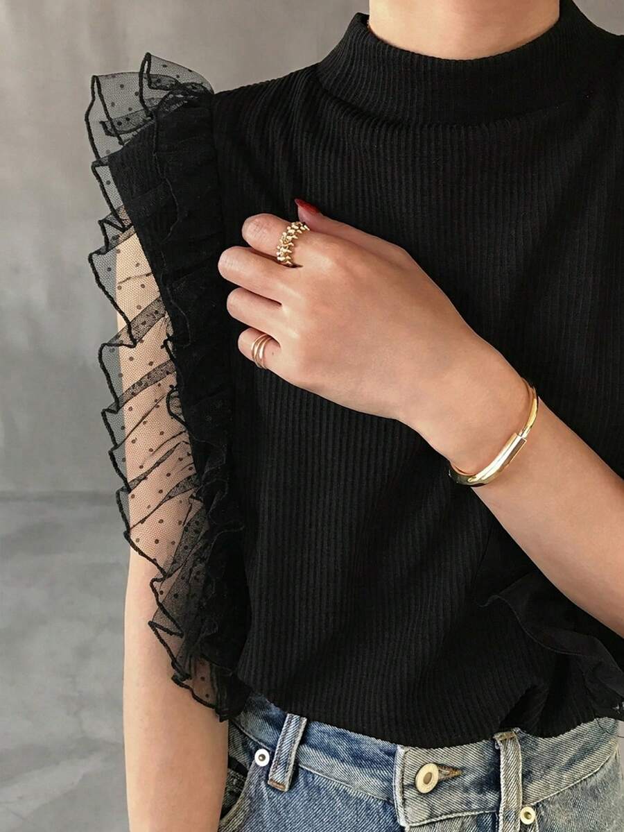 FRIFUL Camiseta sin mangas de mujer con cuello alto acanalado, con volantes de malla y diseño de capa - Negro - Ver 1