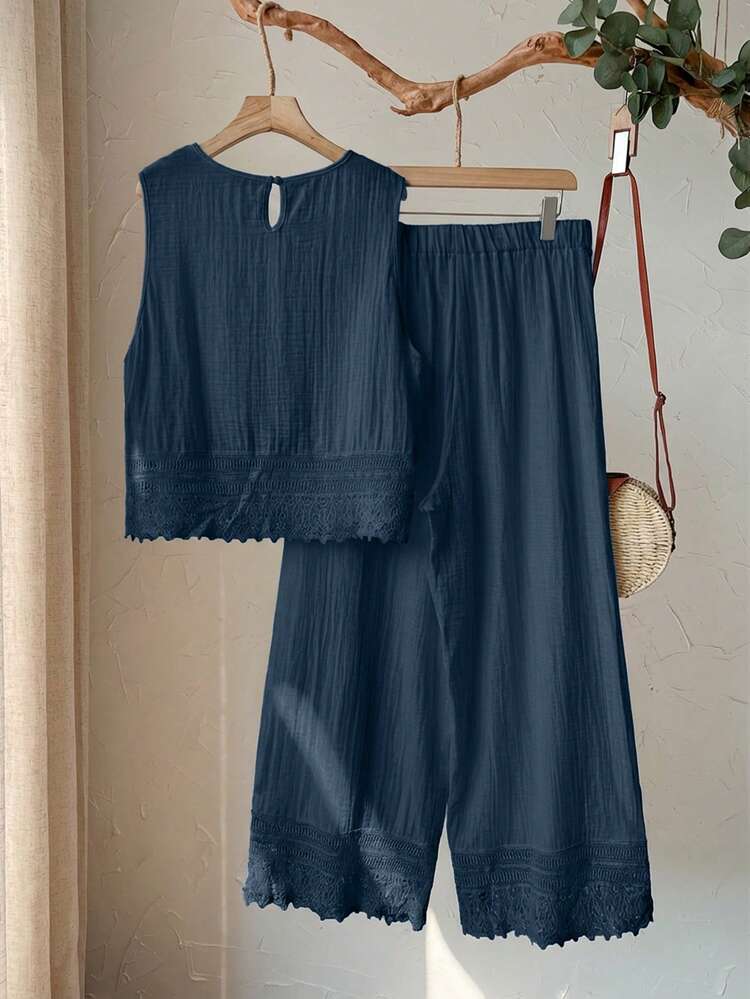 Plus Size Women's Casual Vacation Blue Lace Patchwork Sleeveless Top And Pants 2-Piece Set, Spring/Summer,2pc Set Plus Size Women's Summer Casual Vacation Country Solid Color Navy Blue Lace Patchwork Round Neck Sleeveless Top And Pants 2 Piece Set, Spring/Summer,Comfortable And Breathable,Summer Holiday,Spring Break Outfits ,Vacation Outfits Women ,Holiday Outfits For Women,Going Out Outfits,2026 New Clothes,Simple And Fashionable For Everyday Wear, White Pants Set For Women, Summer Pants Sets, Shirt And Pants Set, Co Ords Sets Women,Modest Two Piece Set, Plus Size Summer Sets, Wide Leg Pants Set,Vest And Pant Set,All-White Set,Suitable For Summer, Vacation, Commute, Daily Wear, Summer Outfits,Gifts For Mother