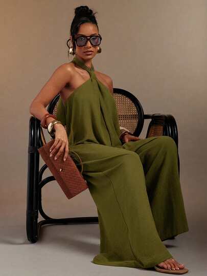 Hauture Bộ jumpsuit nữ gợi cảm, màu trơn, hở lưng, cổ yếm, dáng rộng.