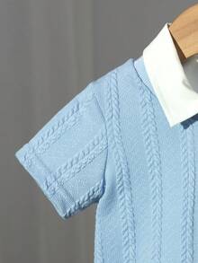 Bộ quần áo 2 món cho bé trai, Áo: Áo len dệt kim màu xanh navy có họa tiết thêu đen ở ngực trái, Quần: Quần kaki, Thích hợp cho đi làm, mặc thường ngày, mùa xuân/hè. - Nhiều màu - Xem 7