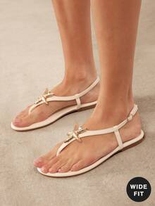 SHUZIA Sandalias de tiras en T blancas con decoración de estrella de mar metálica para mujer SeaGleam - Elegantes, playeras y cómodas. - Blanco - Ver 2