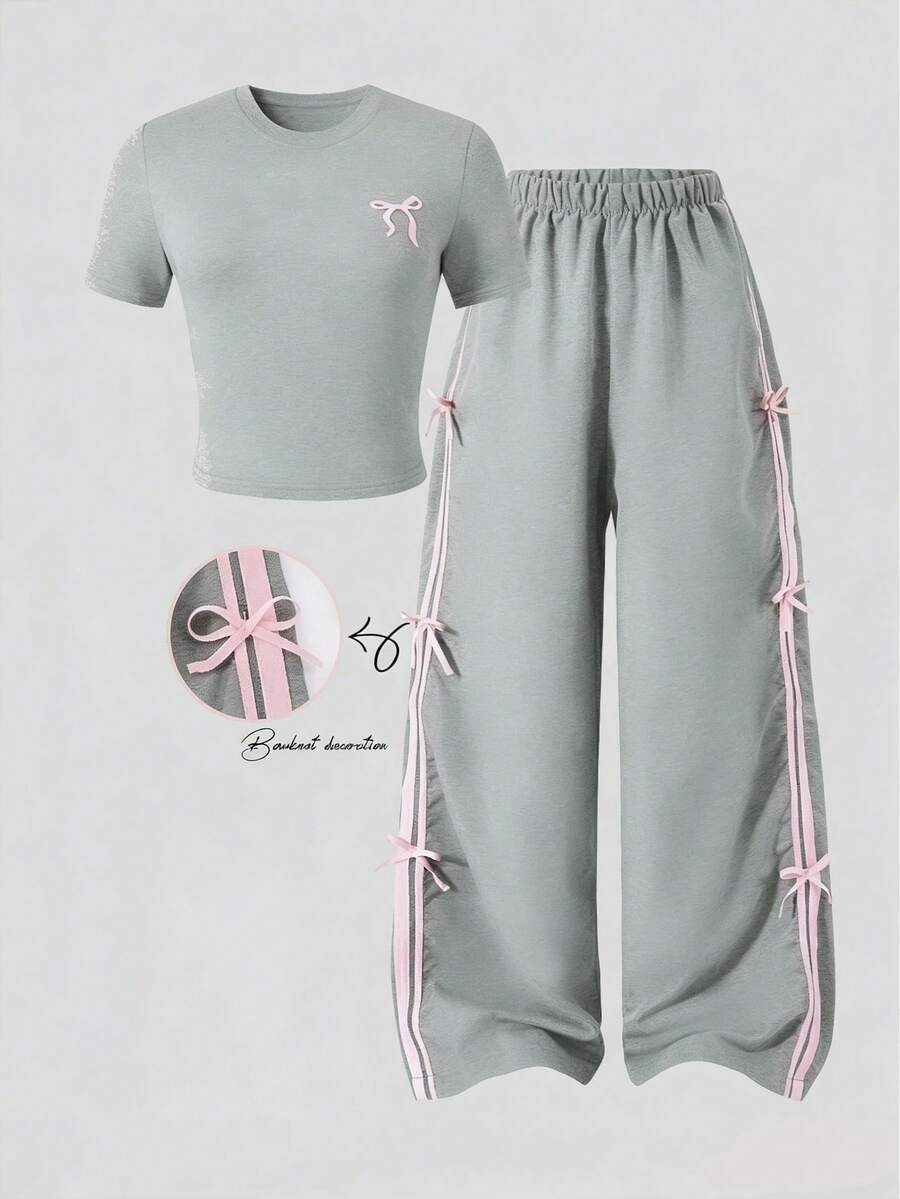 SHEIN 2pcs/Set Setelan Remaja Lengan Pendek & Celana Panjang, Dekorasi Pita Kupu-kupu, Warna Pink, Cocok Untuk Musim Semi/Panas, Olahraga & Pakaian Kasual