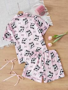 Conjunto de pijama de 2 piezas para niñas grandes, con cuello en pico, botones abajo, mangas cortas, pantalones cortos, de verano, en color rosa con ribete de satén en contraste y estampado lindo de taza de leche. Ropa de dormir, ropa de estar por casa, de tela de seda sintética suave, transpirable y ligera, de moda, elegante y con estilo para niños. - Rosa - Ver 2