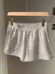 SHEIN EZwear Damshorts med halvhög midja, retro, casual, kamouflage- och leopardmönster, lösa shorts för vardagsbruk, böljande shorts, oumbärliga för skolstarten, lämpliga för vår/sommar - Multifärgad - Visa 2
