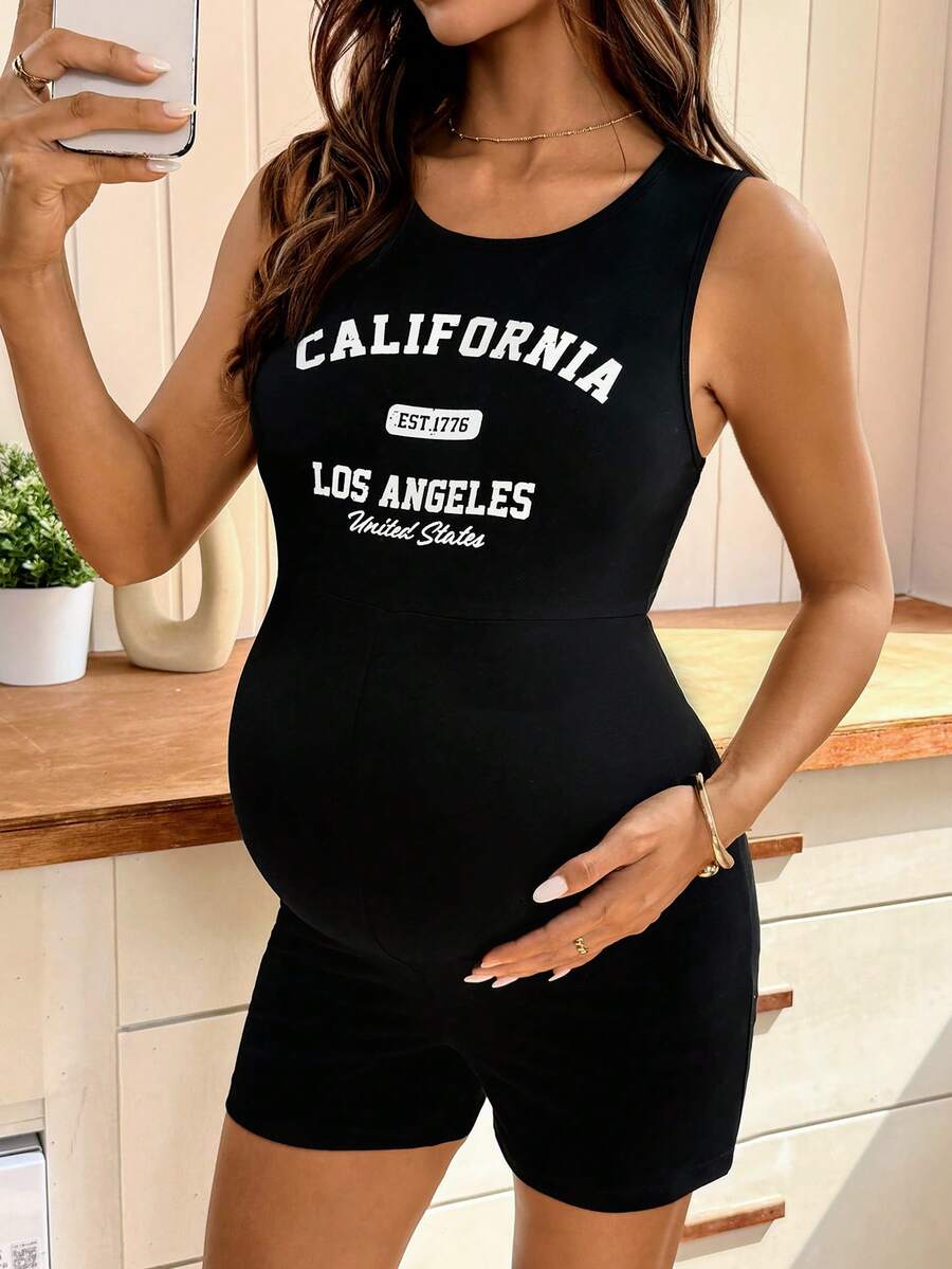 Modmama Áo liền quần bầu cổ tròn in chữ, kiểu dáng thường ngày. - màu đen - Xem 1